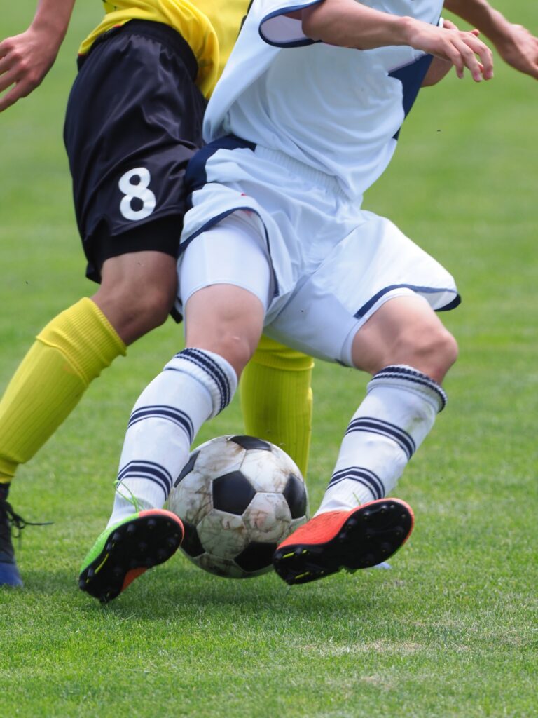 soccer trying to win the ball